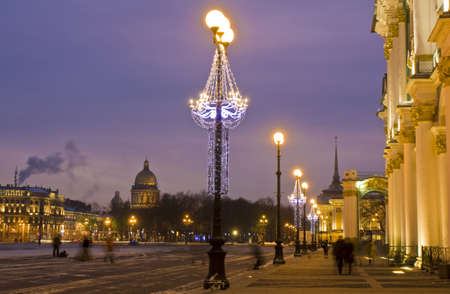 St. Petersburg, Russia, cathedral of St. Isaak (Isaakiyevskiy) and entrance to Hermitage art museum (Winter palace) at night with Christmas illumination.のeditorial素材