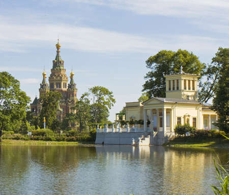 Peterhof, Russia - July 06, 2012  cathedral of St  Peter and St  Paul and palace of princess Olga in Peterhof, surroundings of St  Petersburgのeditorial素材