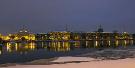 St. Petersburg, Russia, quay of river Neva at night with building of Admiralty in winter.のeditorial素材