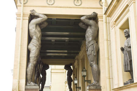 St. Petersburg, Russia - July 14, 2012: sculptures of Atlases near entrance of new building of Hermitage art museum.のeditorial素材