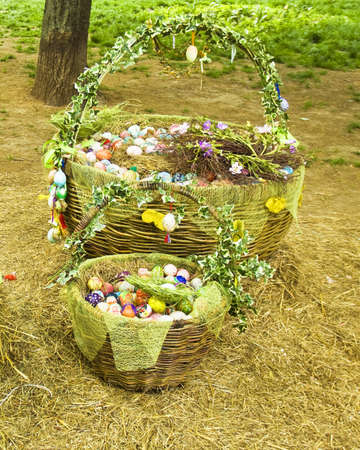 Kiev, Ukraine - May 06, 2012: Two baskets with painted eggs for Easter holiday, decoration of city park.のeditorial素材
