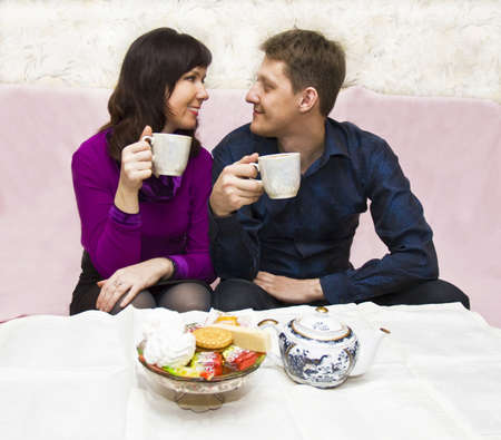 Couple man and woman European drinking tea at home.の写真素材