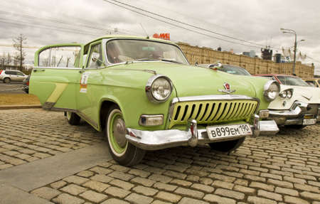 MOSCOW - APRIL 21: Russian retro car Volga on rally of classical cars on Poklonnaya hill,  April 21, 2013, in town Moscow, Russia.のeditorial素材