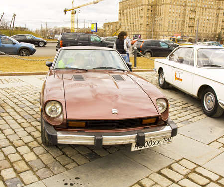 MOSCOW - APRIL 21: rally of classical cars on Poklonnaya hill,  April 21, 2013, in town Moscow, Russia, datsun.のeditorial素材