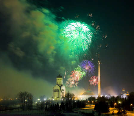 Moscow, salute and church of St. George and historical museum of Second World War on Poklonnaya hill devoted to the day of Russian army on 23th of Febraury.の写真素材