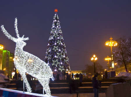 MOSCOW - JANUARY 06: electric sculpture of deer and Christmas - New Year tree, street decoration to Christmas and New Year holidays on Pushkinskaya square, January 06, 2013, in town Moscow, Russia.のeditorial素材