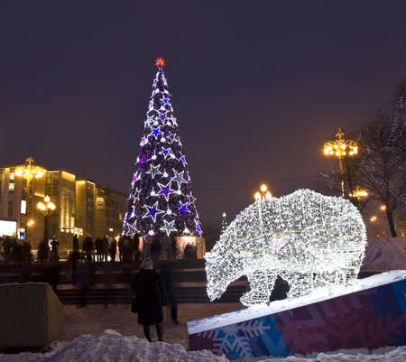 MOSCOW - JANUARY 01: electric sculpture of bear and Christmas tree on Pushkinskaya square - cultural centre of the city, near cinema "Russia", beginning of Tverskoy boulevard street, January 01, 2013, in town Moscow, Russia.のeditorial素材
