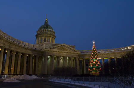 ST. PETERSBURG - DECEMBER 24, 2012: Christmas - New Year tree and Kazanskiy cathedral (Kathedral of Kazanskaya icon of St. Mary) at night December 24, 2012, in town St. Petersburg, Russia.のeditorial素材