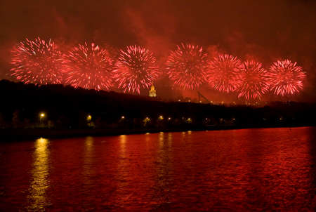 Salute of red colour in Moscow on Vorobyevi hills near building of University in festival "Circle of light".の写真素材