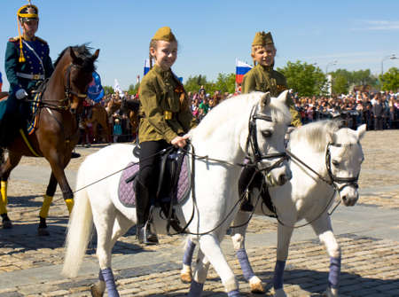 MOSCOW - MAY 9, 2014  cavalry show in memorial  Poklonnaya hill devoted to holiday Victory day of victory in Second World War, participants President cavalry regiment and Kremlin cavalry school のeditorial素材