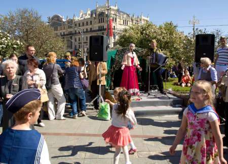 MOSCOW - MAY 9, 2014  Holiday Victory Day devoted to victory in Second World War, artists sing on Theatre square and children dancing 	のeditorial素材