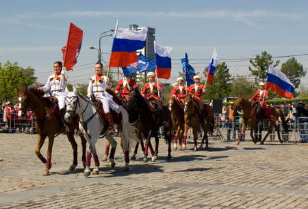 MOSCOW - MAY 9, 2014: cavalry show in memorial  Poklonnaya hill devoted to holiday Victory day of victory in Second World War, participants President cavalry regiment and Kremlin cavalry school.のeditorial素材
