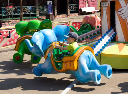 MOSCOW - JULY 01, 2014: people rest on attractions in Izmaylovsky park - the biggest park in Europe.のeditorial素材