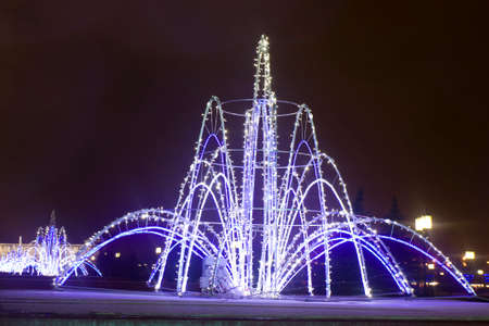 MOSCOW - DECEMBER 23, 2014: Christmas illumination electric fountains in memorial complex on Poklonnaya hill.のeditorial素材