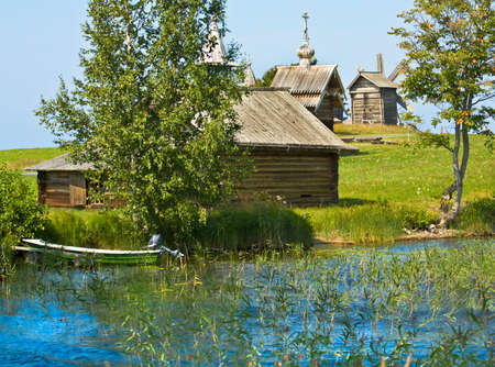 Old wooden churches on island Kizhi on Onega Onezhskoye lake in region Karelia on North of Russia, UNESCO World Heritage site.のeditorial素材