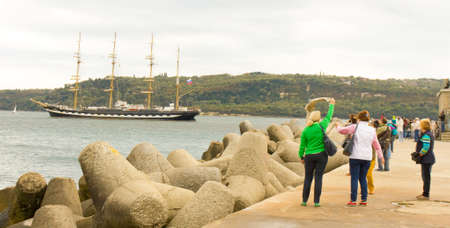 VARNA, BULGARIA - OCTOBER 4, 2016: Black Sea Tall Ships Regatta, sailing ships from different countries leave port and sail to Greece.のeditorial素材