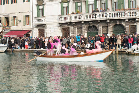 VENICE, ITALY - FEBRAURY 09, 2020: grand opening of carnival with water parade on Canarregio canal.のeditorial素材