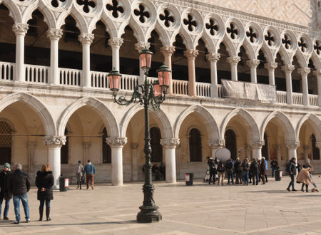 VENICE, ITALY - FEBRAURY 08, 2020: Doges palace and tourists around.
