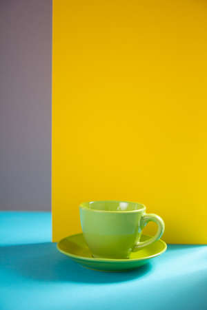 Coffee cup at abstract paper background texture as minimalism concept styleの写真素材