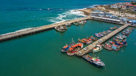 Boats in port at Kalk Bay fishing harbour, Cape Town, South Africa.のeditorial素材
