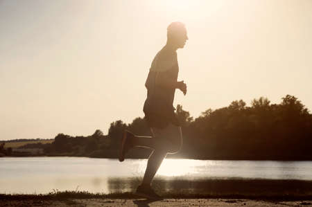 Man doing cardio workout, running.の写真素材
