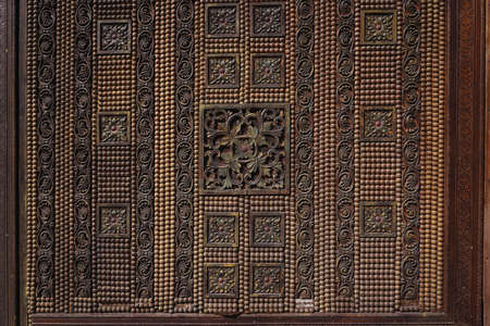 Beautiful wood carving, handmade door in muslim oriental style.