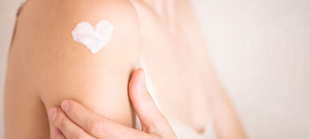 Woman gently cares for her body.の写真素材