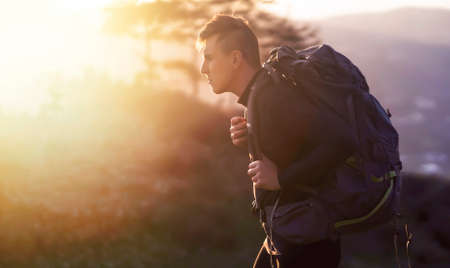 A traveler is hiking and looking on beautiful view.の写真素材