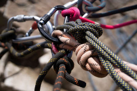 Carabiners and ropes in the mountains.の写真素材