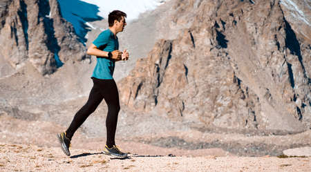 Man is running, training in the moruntains.の写真素材