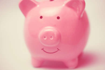 Cute pink piggy bank, close up view.の写真素材