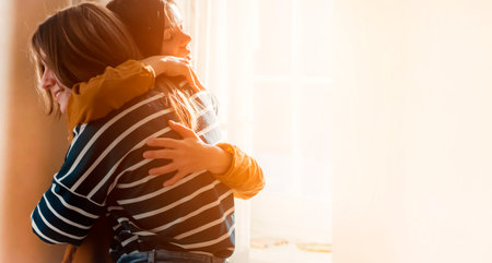 Two girls hug and congratulate each other.の写真素材