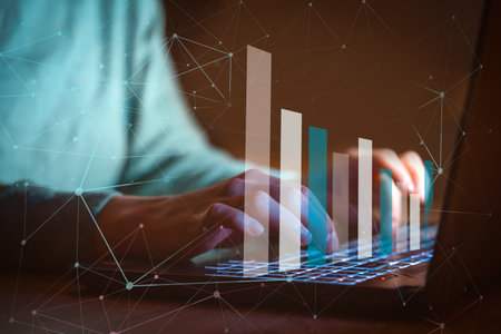 Hands are typing on a laptop kayboard, business with a growth.の写真素材