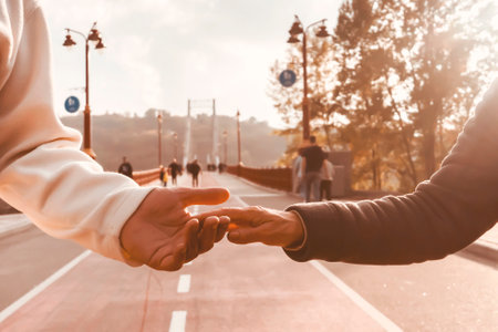 Couple, man and woman hold hands, with love and care