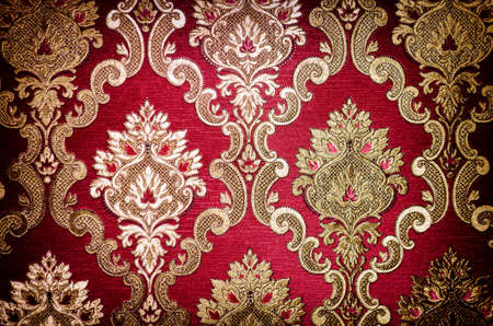 Beautiful closeup pattern in red and golden tones.の写真素材