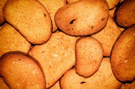 Lots of bread crumbs yellow closeup の写真素材