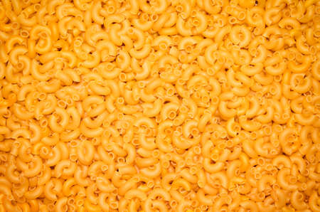 Pasta horns yellow closeup の写真素材