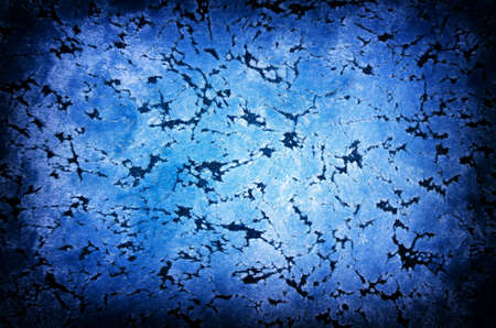Blue background from a fabric with texture and black vignette.の写真素材