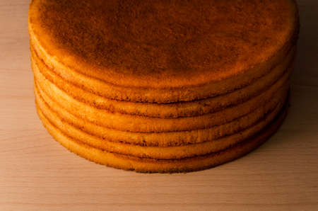 Fresh round shortcakes closeup on wooden backgroundの写真素材