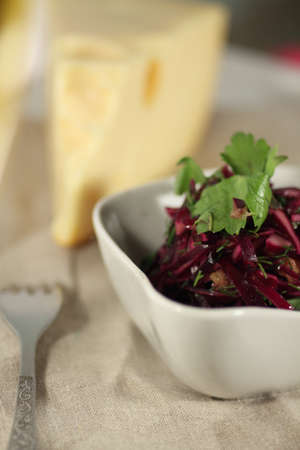 a bowl of salad and cheeseの写真素材