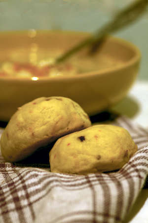 two scons and plateful of soupの写真素材