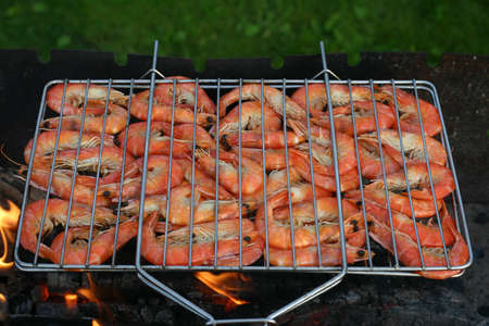 cooking prawns on the fireの写真素材