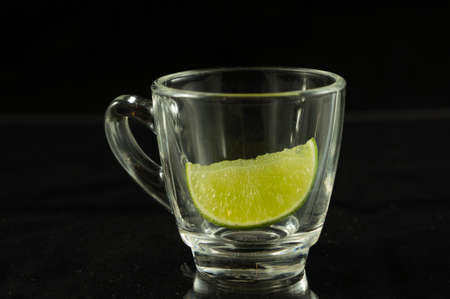 lemon lime in glass shotの写真素材