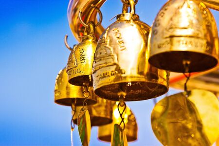 buddha golden bell in the templeの写真素材