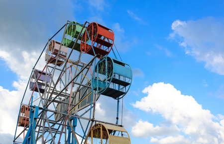 Close Up Of Ferris Wheel With Blue Sky In The Backgroundの写真素材