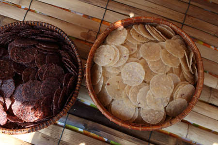 Crispy Rice In Baskets On Bamboo Litterの写真素材