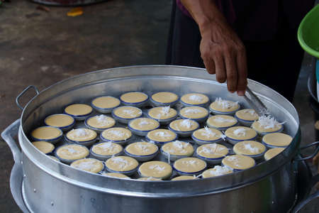 Chef Cooking Toddy palm cakeの写真素材