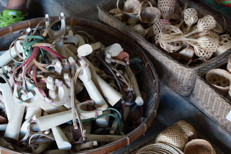 Pile Of Wooden Slingshots In The Basketの写真素材