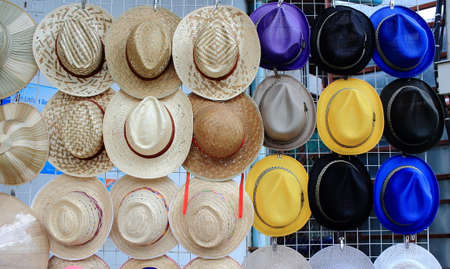 Row Of Vintage Weaving Hats Hanging On The Grilleの写真素材