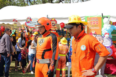 Bangkok, Thailand - 9 Jan 2016 : Fireman With Superhero Cosplay In Thailand National Children's Day At Wachira Benchathat Public Parkのeditorial素材